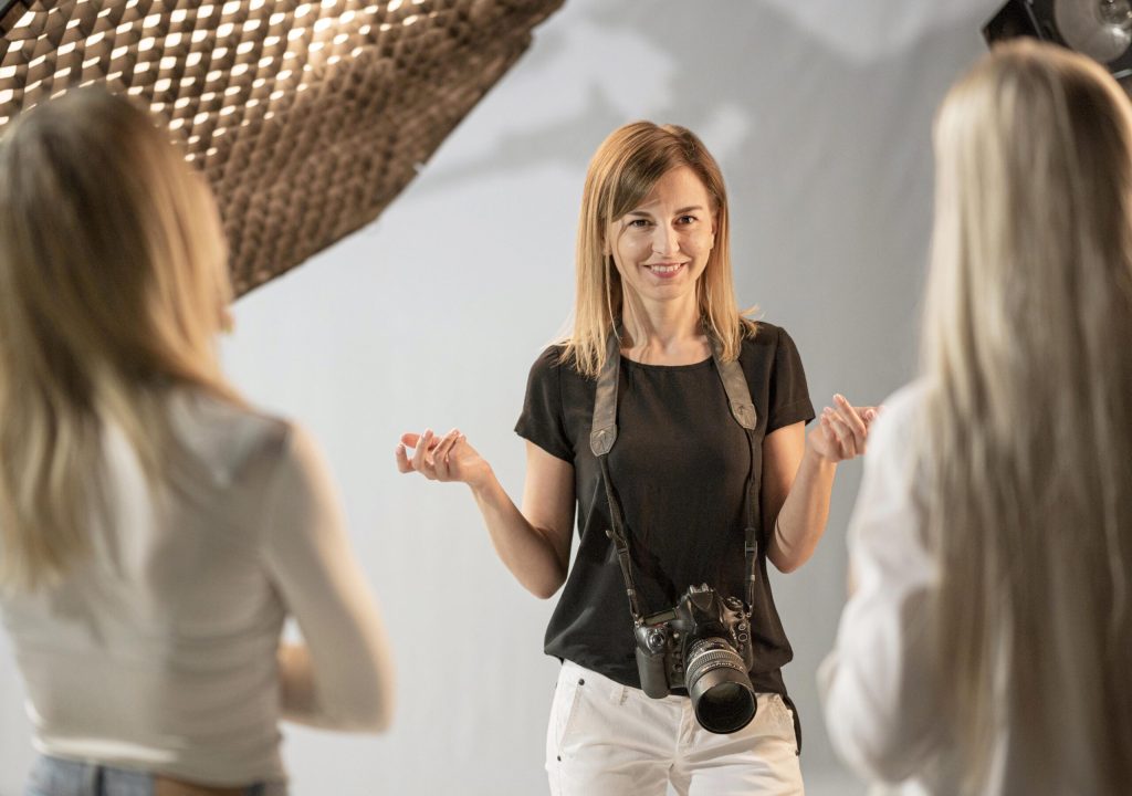 female photographer models talking